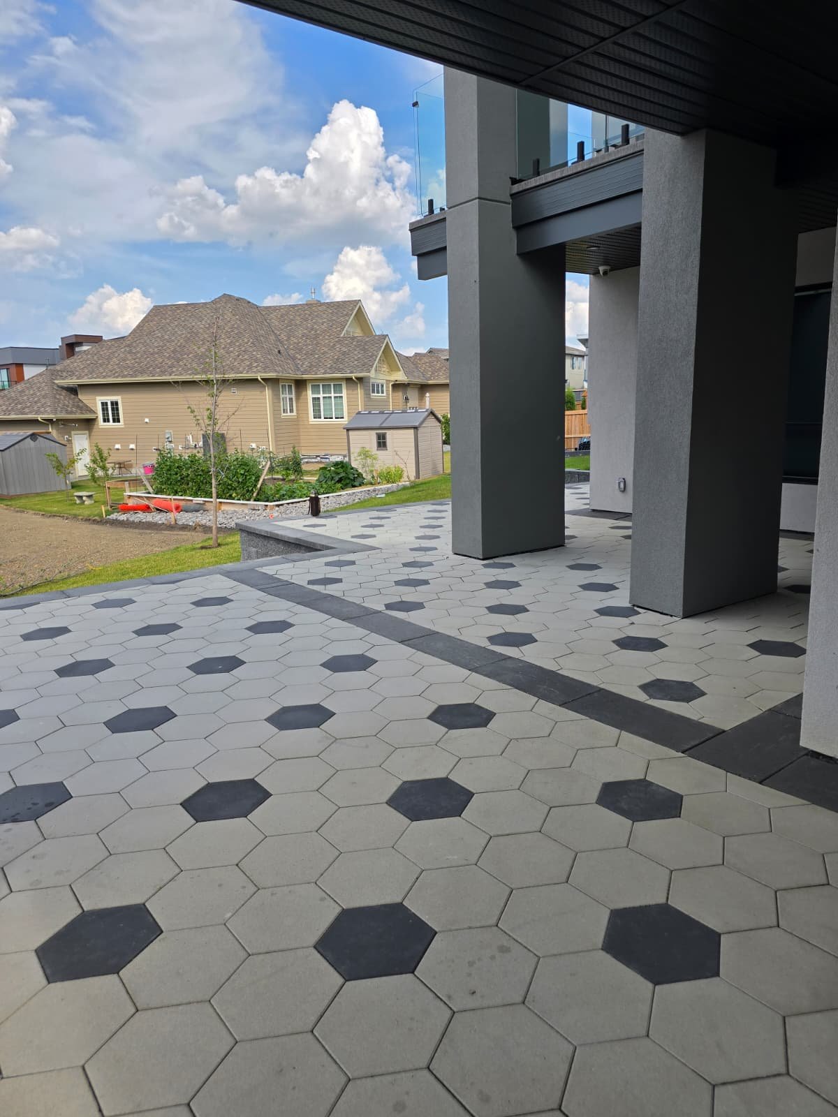 Two-tone hexagonal paver tile commercial entryway — Edmonton